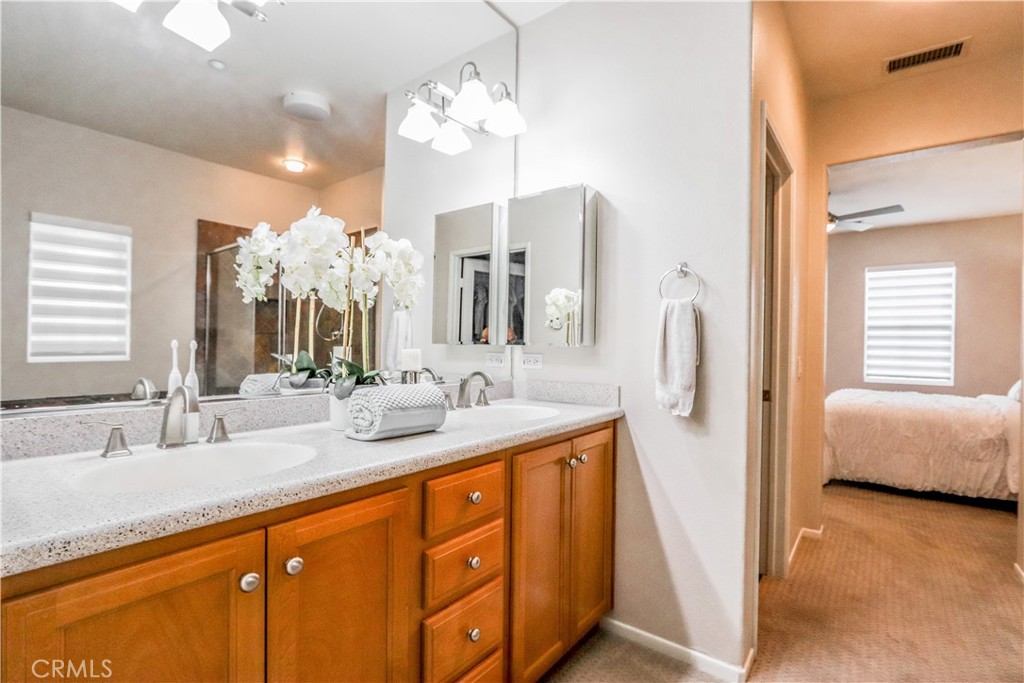 264 Lockford Irvine, CA 92602 - Photo 10 of 15 a bathroom with a double vanity sink and a mirror