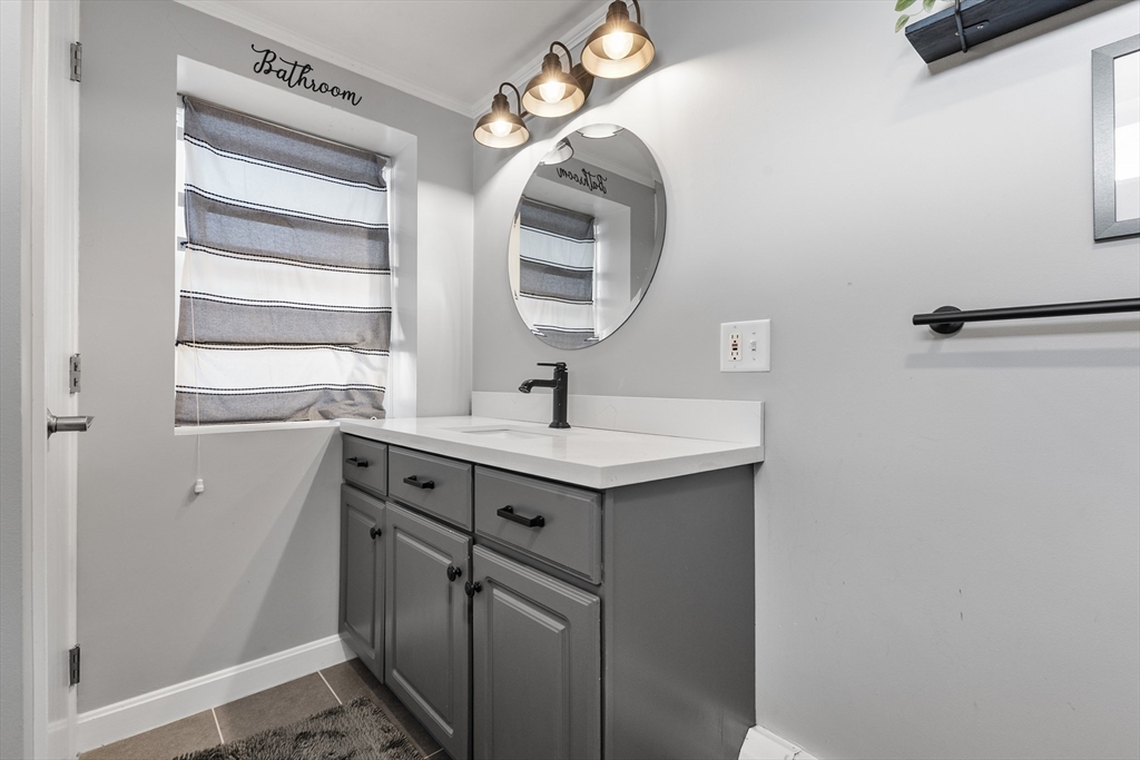 3 Suntaug Street Lynnfield, MA 01940 - Photo 13 of 42 a bathroom with a sink and a mirror