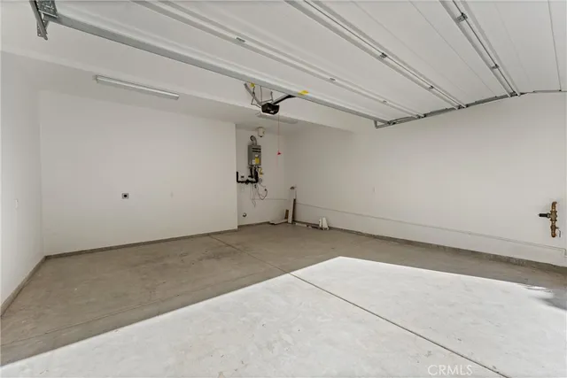 a view of a room with ceiling fan