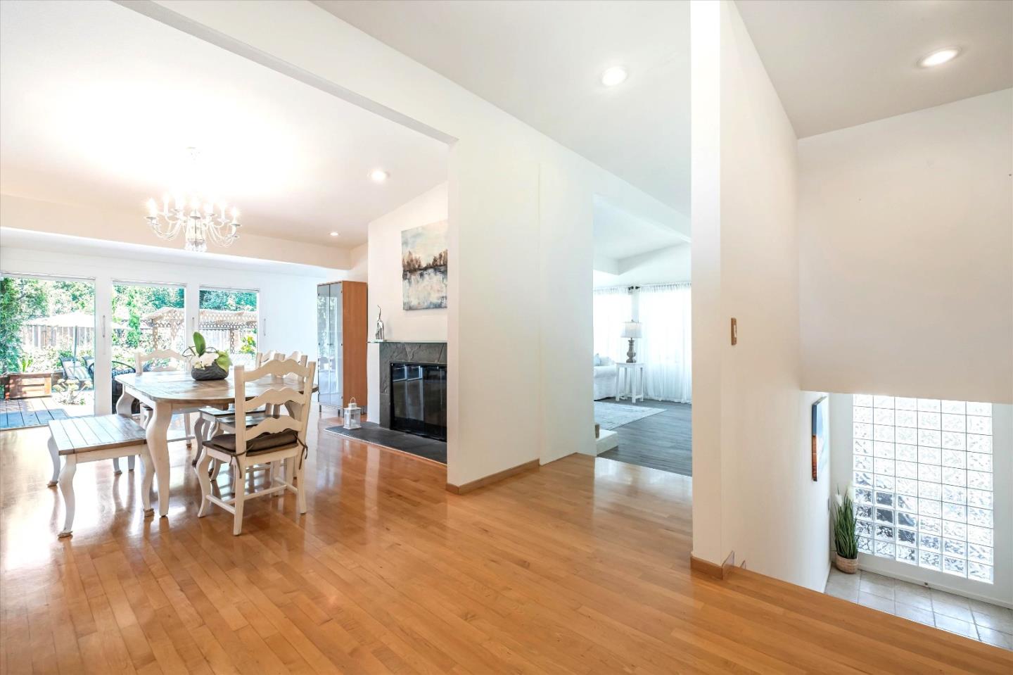 3386 Haas Drive Aptos, CA 95003 - Photo 12 of 56 a view of a dining room with furniture window and wooden floor