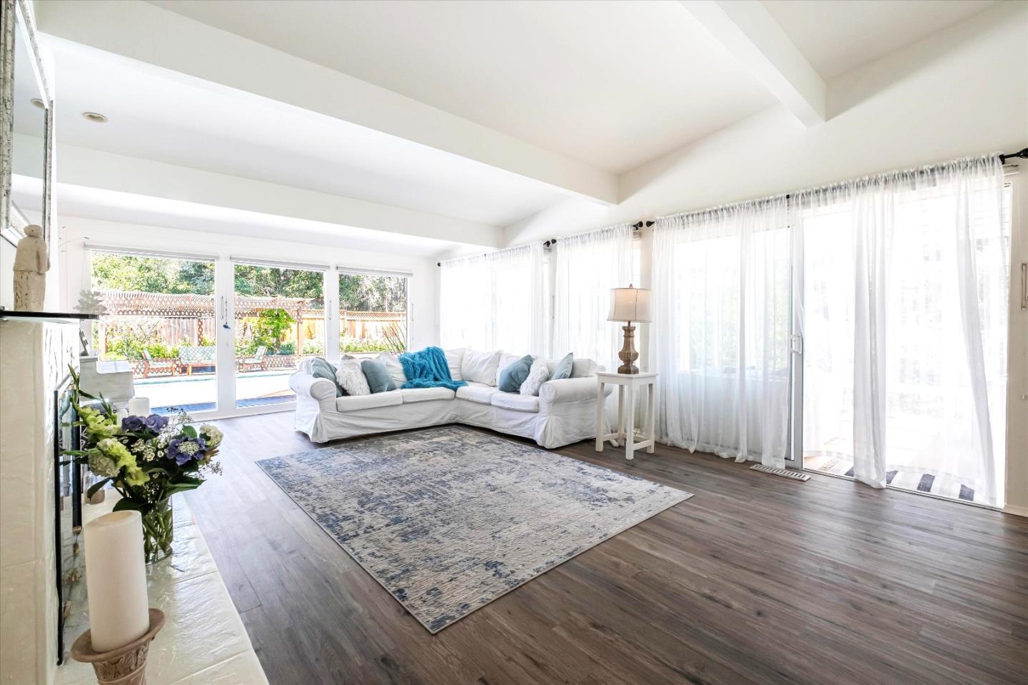 3386 Haas Drive Aptos, CA 95003 - Photo 16 of 56 a living room with furniture and a large window