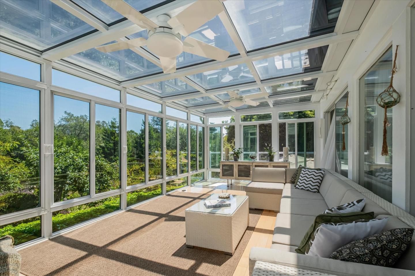 3386 Haas Drive Aptos, CA 95003 - Photo 18 of 56 a living room with furniture and a floor to ceiling window