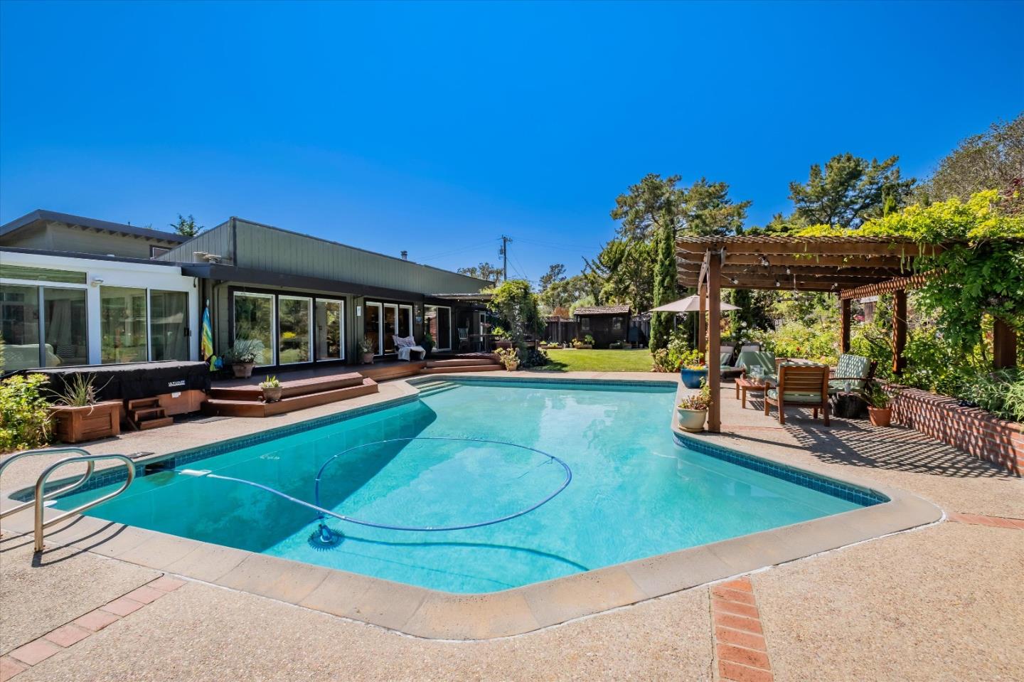 3386 Haas Drive Aptos, CA 95003 - Photo 2 of 56 a view of a house with swimming pool