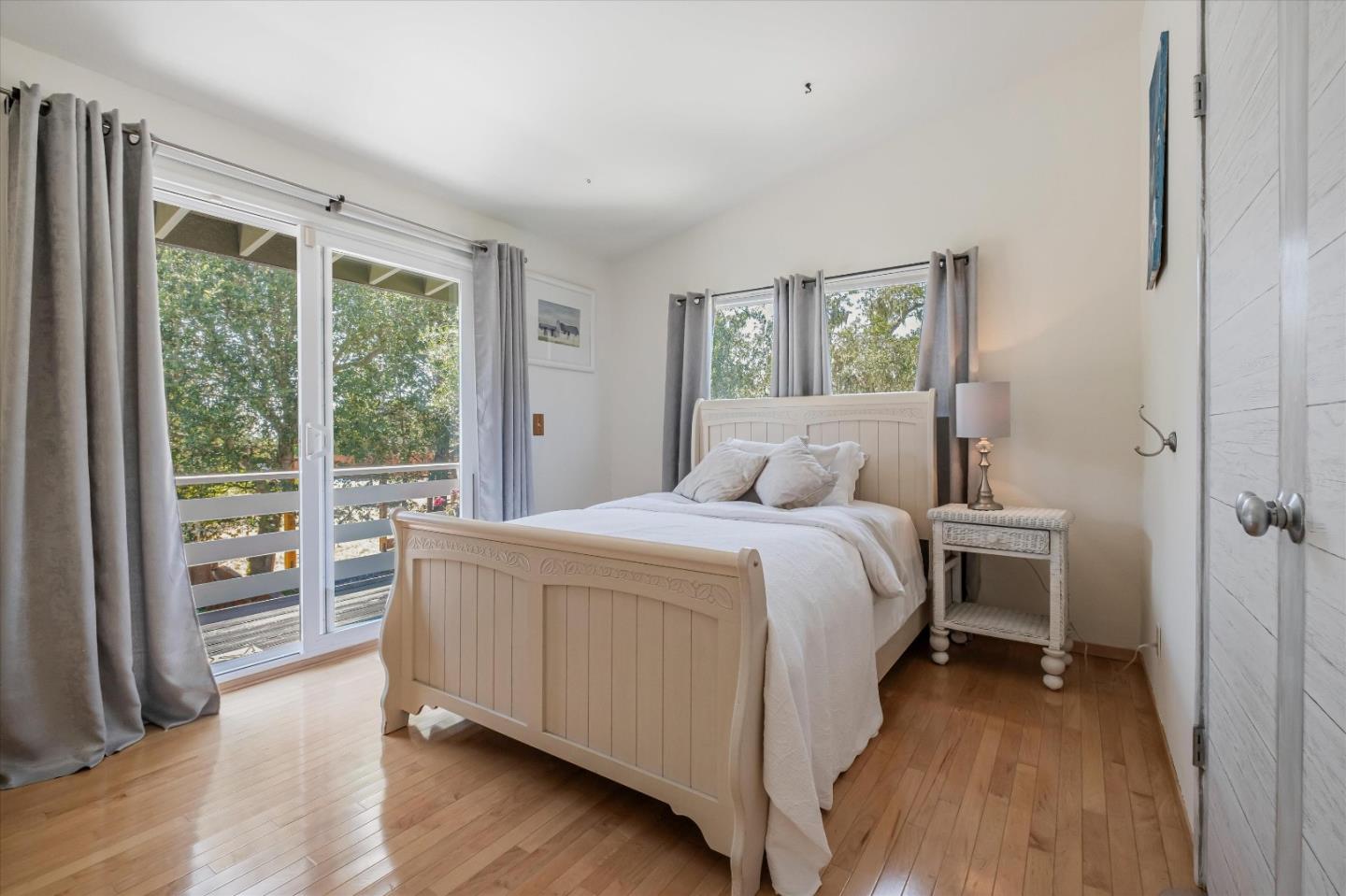 3386 Haas Drive Aptos, CA 95003 - Photo 26 of 56 a bedroom with a bed and a large window