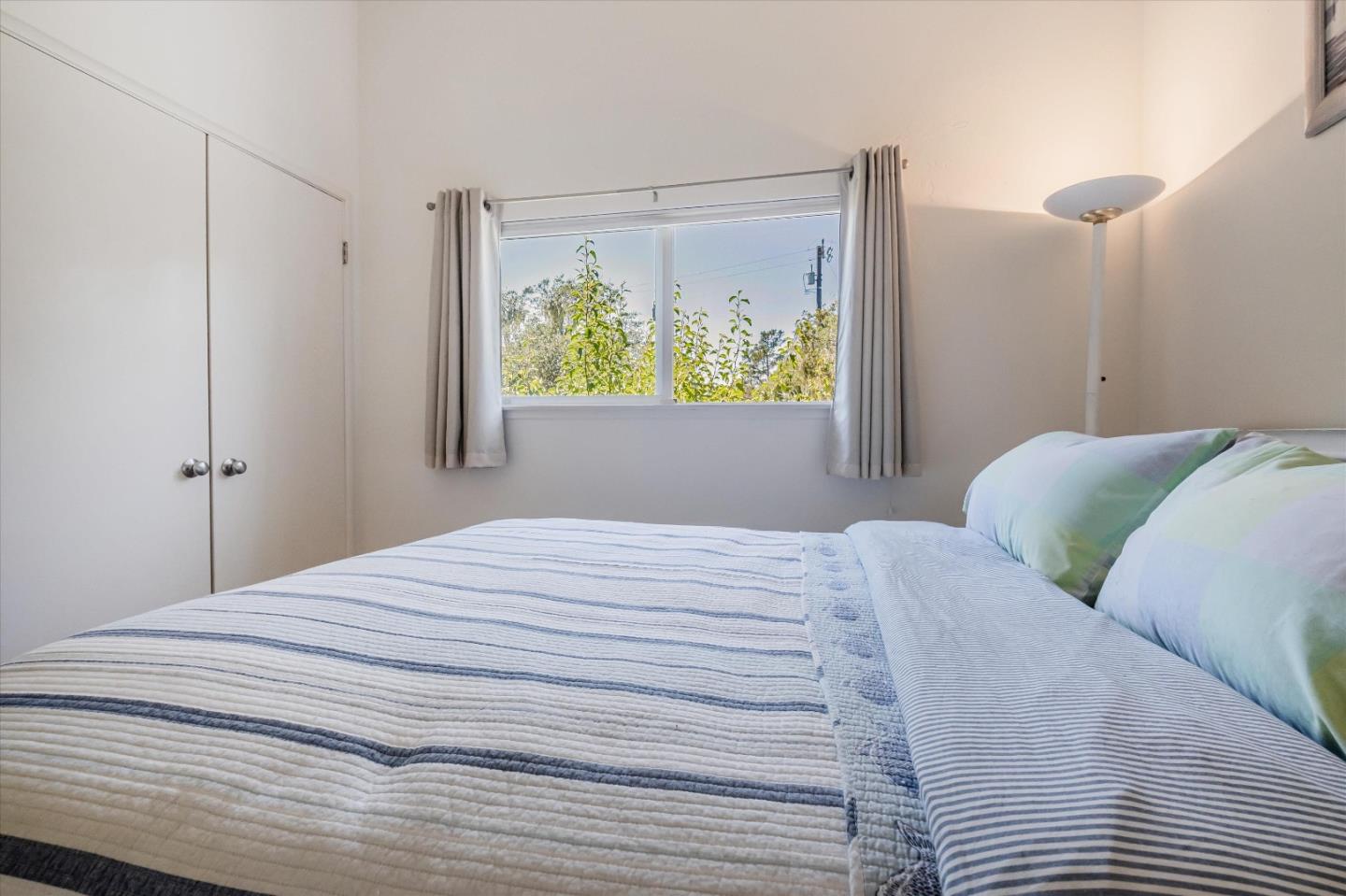 3386 Haas Drive Aptos, CA 95003 - Photo 28 of 56 a bedroom with a bed and a window