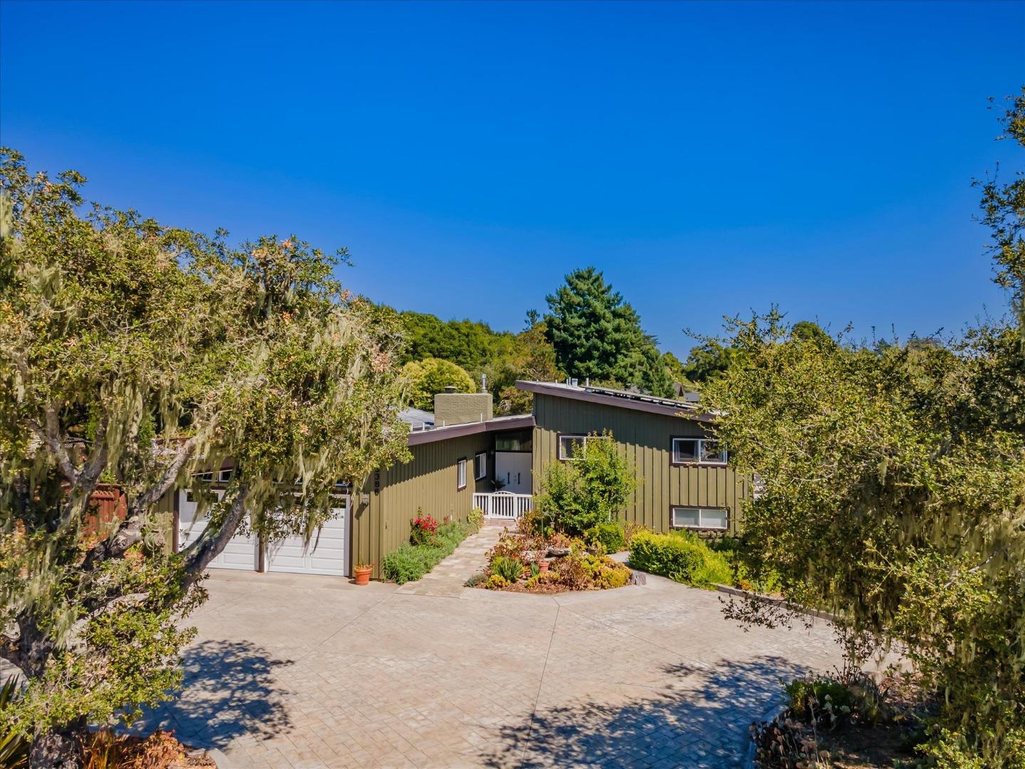 3386 Haas Drive Aptos, CA 95003 - Photo 7 of 56 a front view of a house with a yard