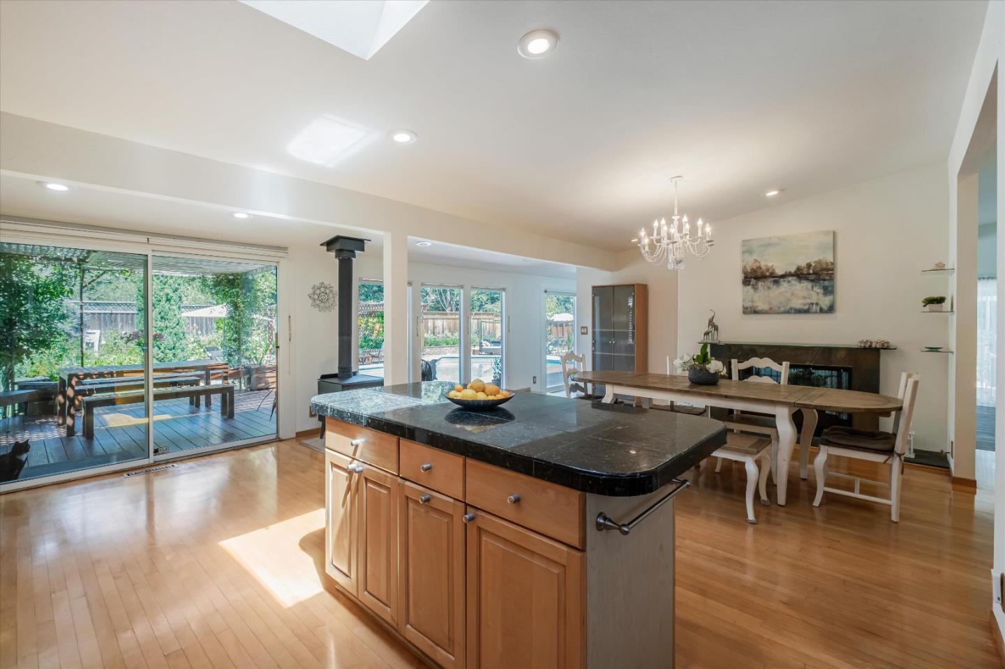 3386 Haas Drive Aptos, CA 95003 - Photo 10 of 56 a kitchen with stainless steel appliances granite countertop a sink a stove and wooden floor