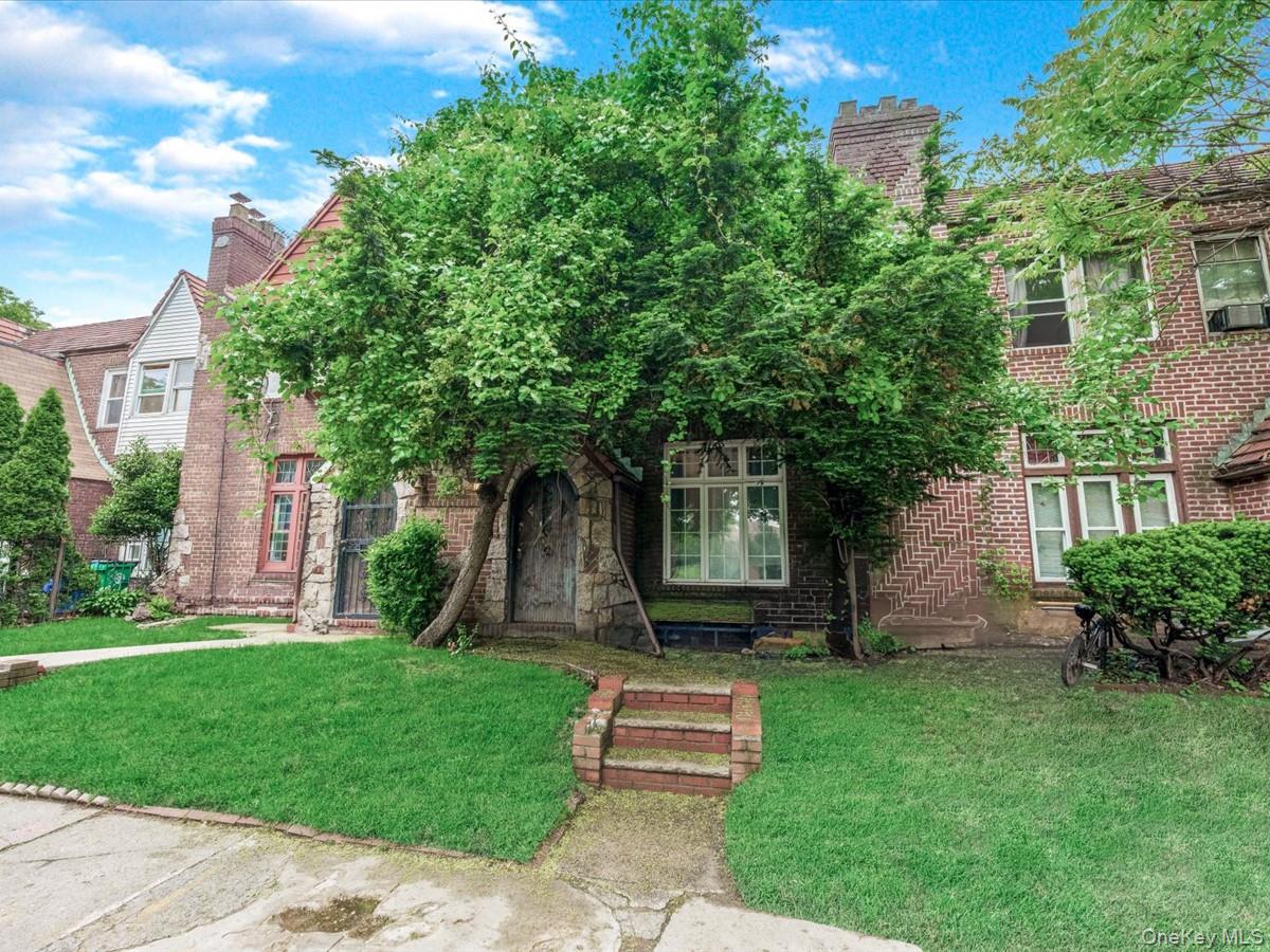 172-09 Sayres Avenue Queens, NY 11433 - Photo 23 of 23 a front view of a house with garden