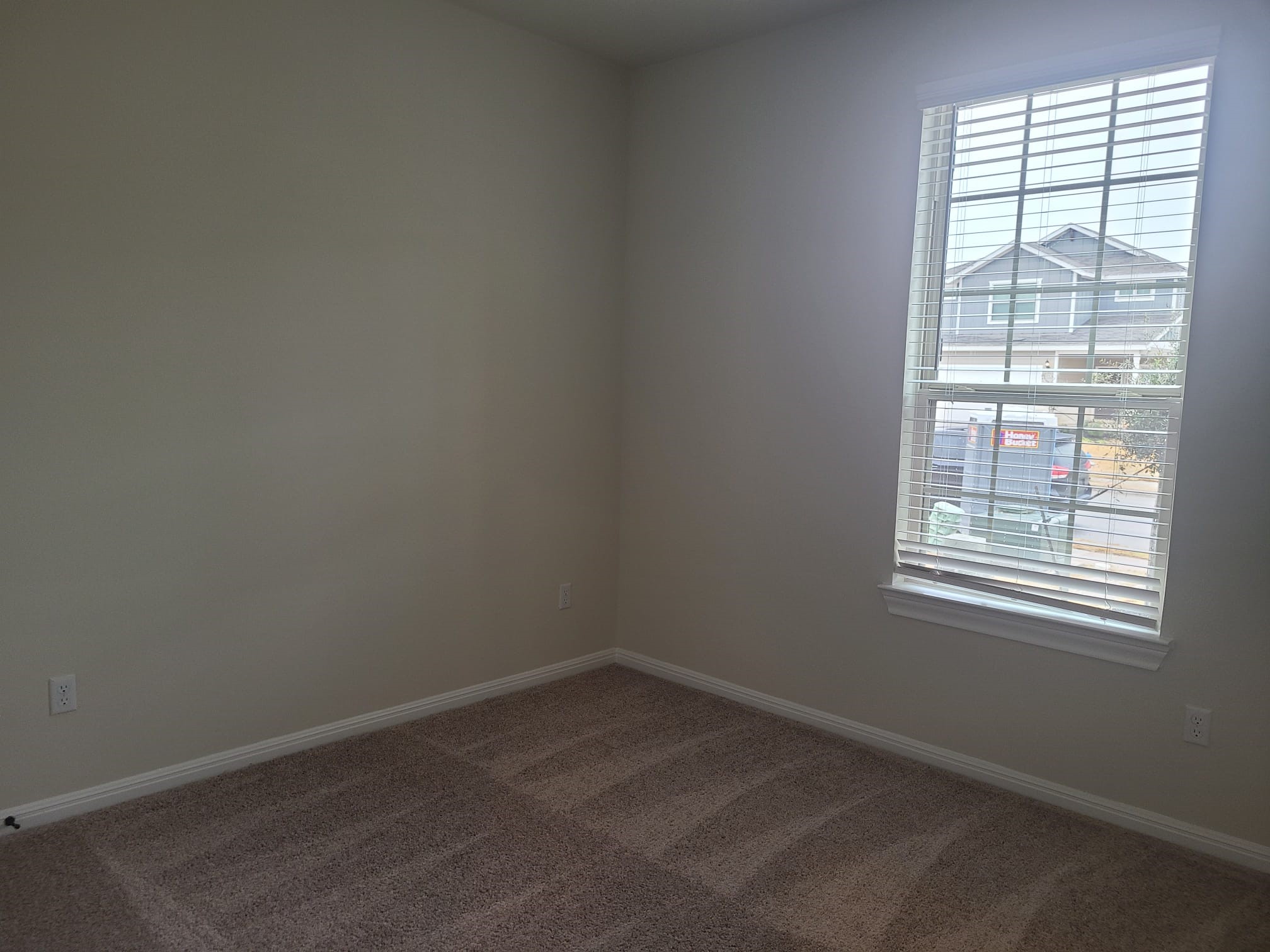 32 Pacific Loon Street Leander, TX 78641 - Photo 14 of 34 an empty room with a window
