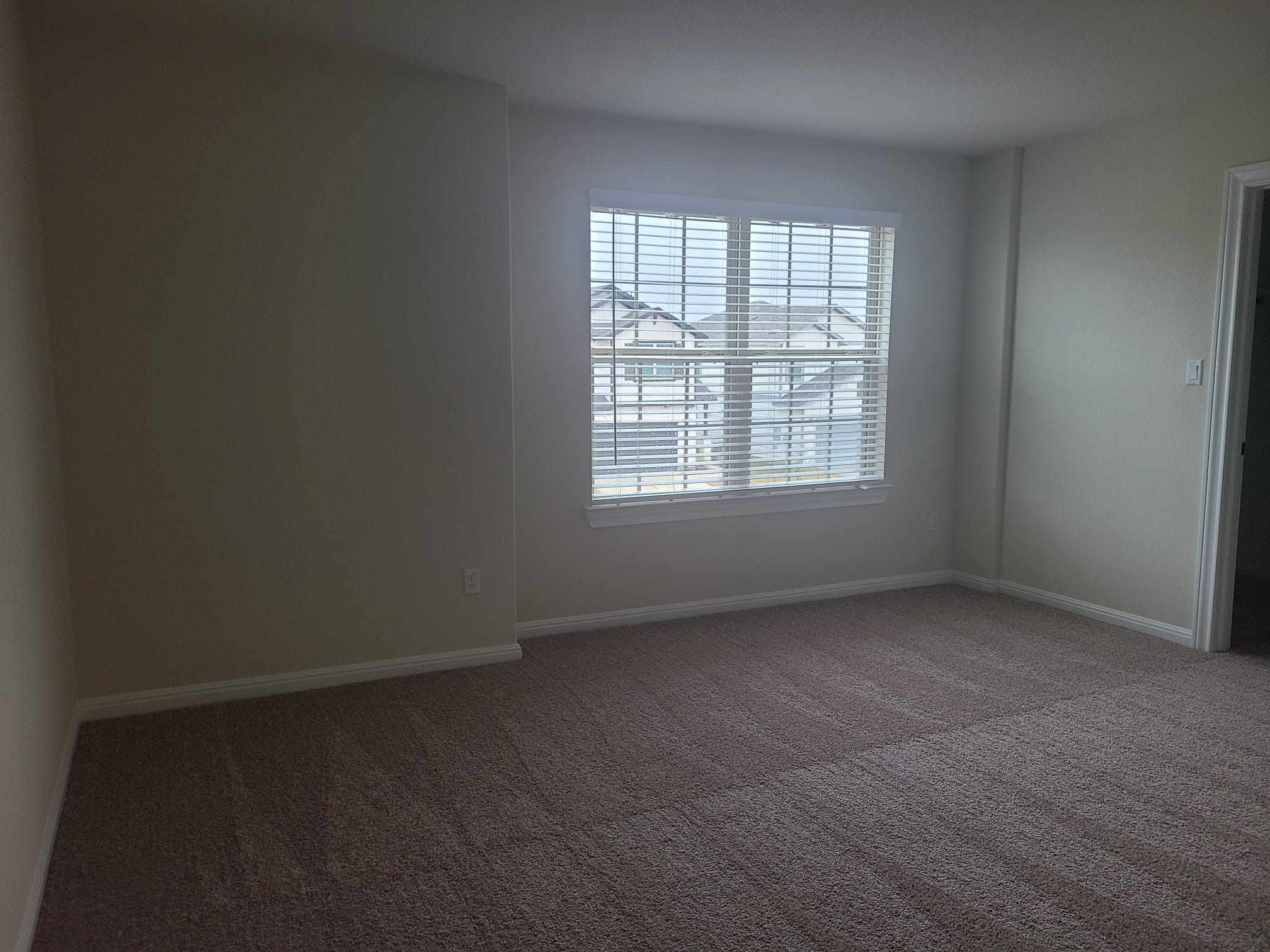32 Pacific Loon Street Leander, TX 78641 - Photo 21 of 34 an empty room with a window