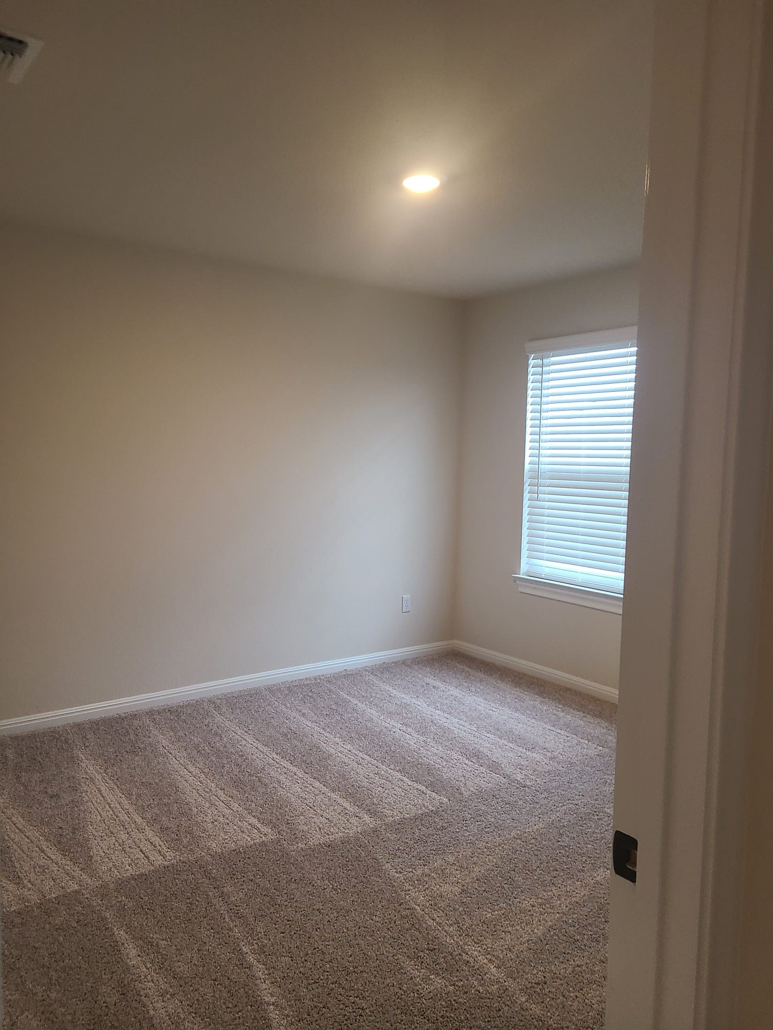 32 Pacific Loon Street Leander, TX 78641 - Photo 25 of 34 an empty room with windows