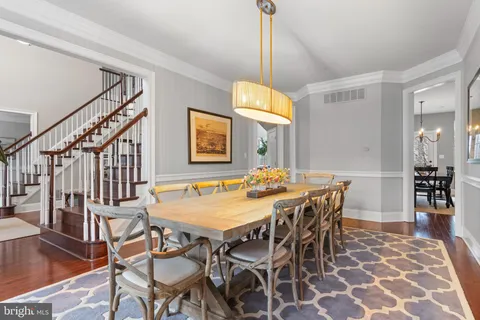 a view of a dining room and chandelier
