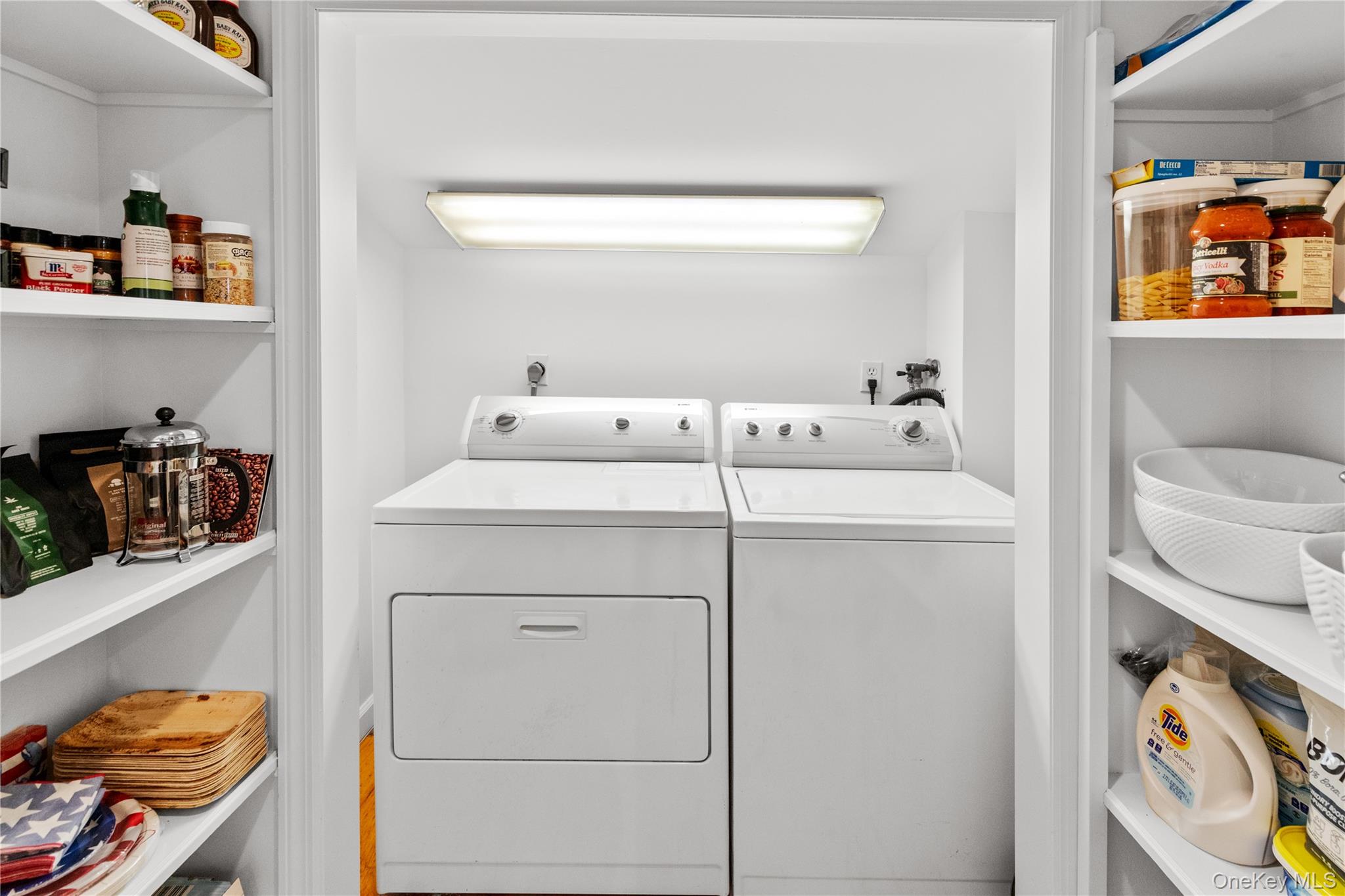 197 Hog Creek Road East Hampton, NY 11937 - Photo 10 of 17 a utility room with dryer and washer