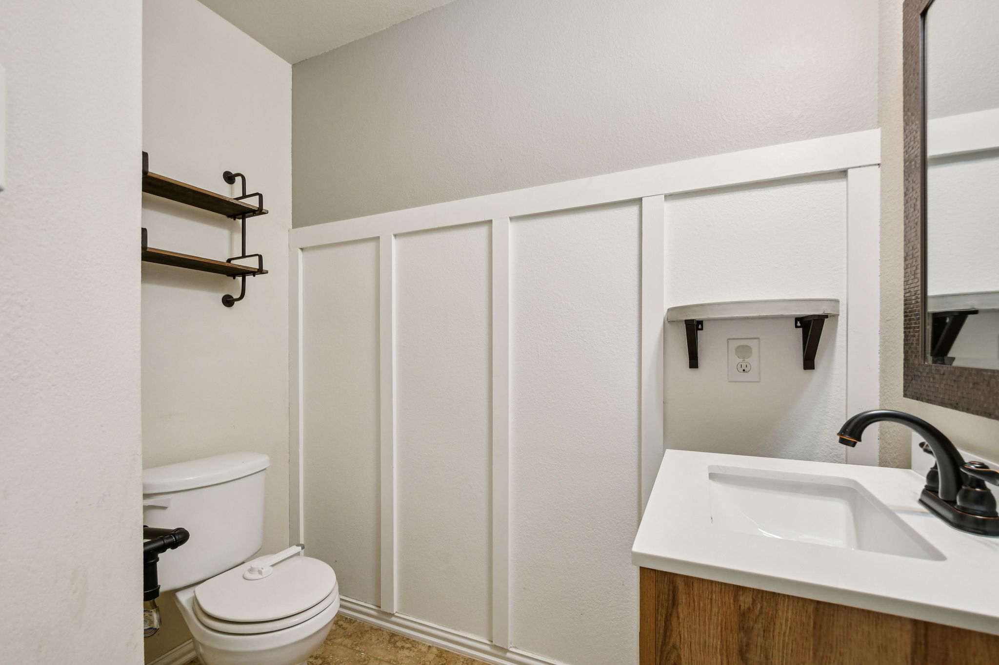 329 Evening Star Kyle, TX 78640 - Photo 14 of 30 A powder room is positioned near the living area for guests.