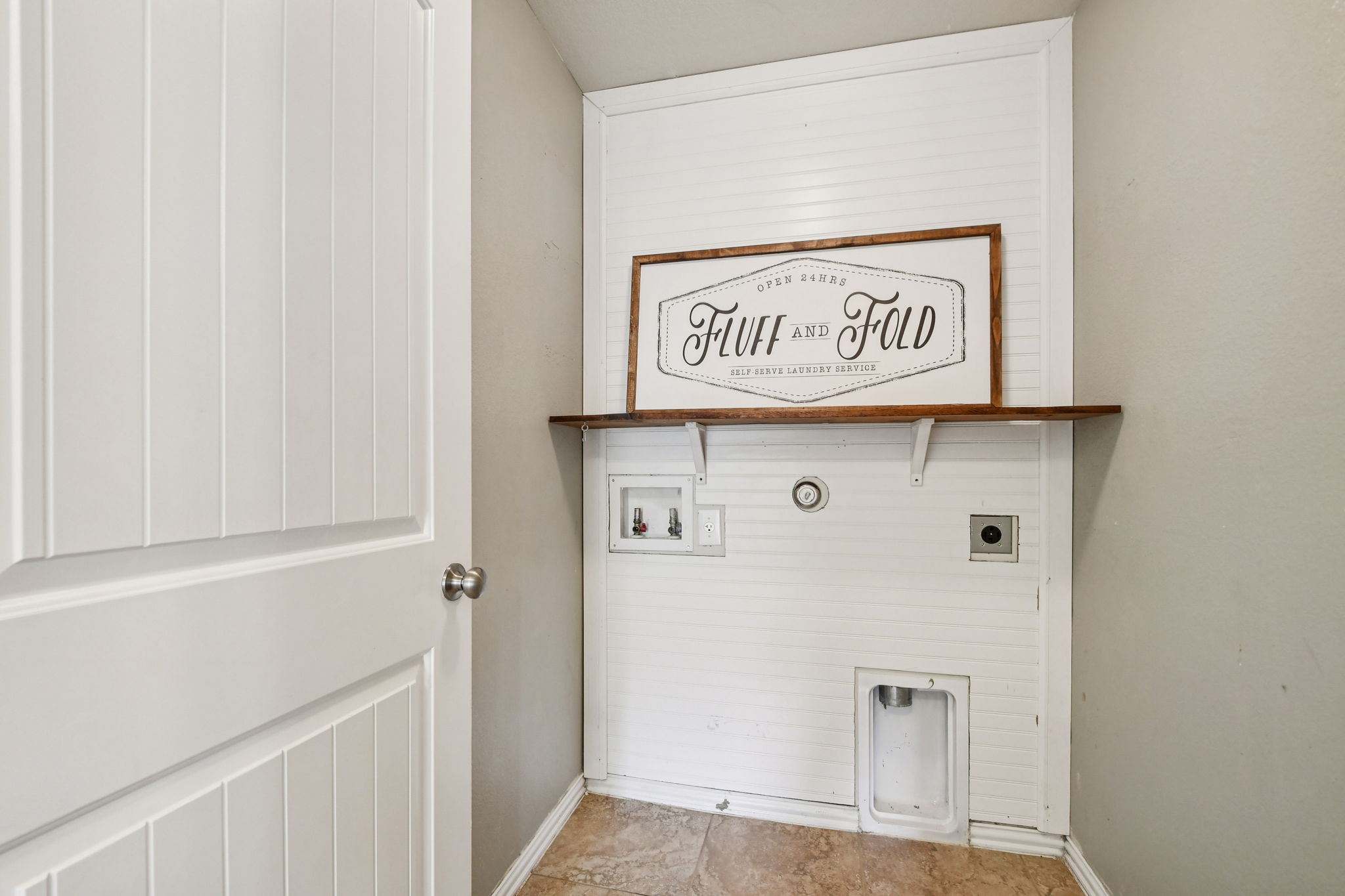 329 Evening Star Kyle, TX 78640 - Photo 21 of 30 Laundry room with a little personality, plus a handy shelf for baskets, supplies, and the “I’ll fold it later” pile.