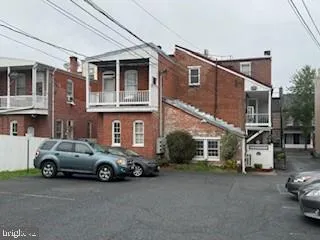 a car parked in front of a house