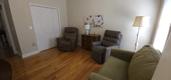 a living room with furniture and a couch