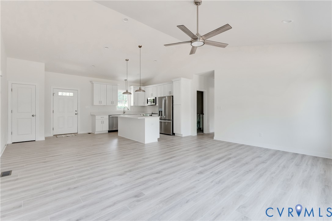 1393 Broad St Road Oilville, VA 23129 - Photo 12 of 39 Unfurnished living room with light wood-style floo