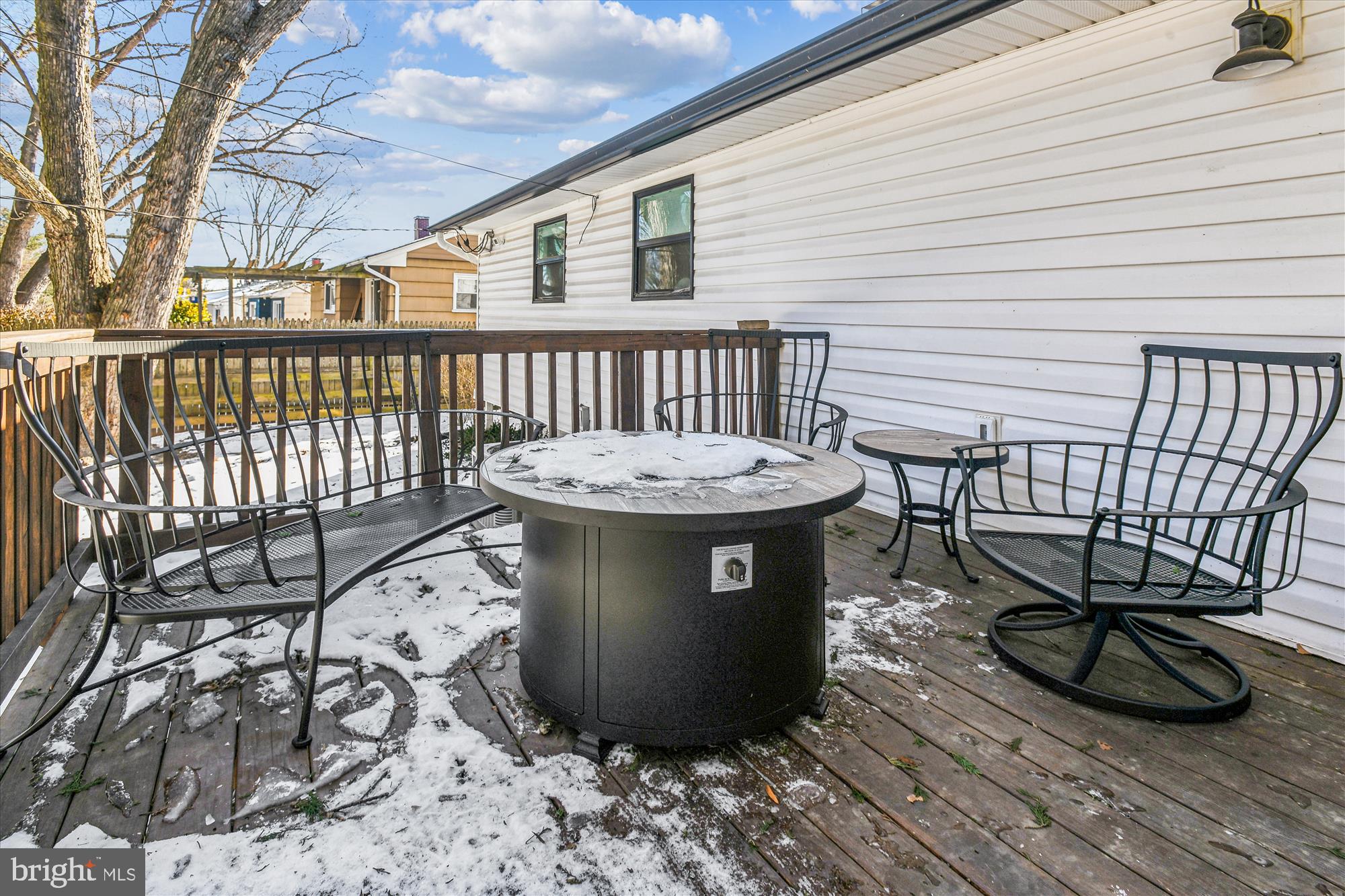 232 Candytuft Road Reisterstown, MD 21136 - Photo 34 of 42 a view of a chairs and table on the deck