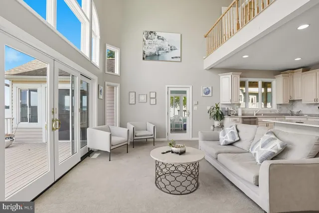 a bathroom with a granite countertop sink a large mirror and vanity