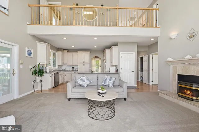 a white bath tub sitting next to a white sink