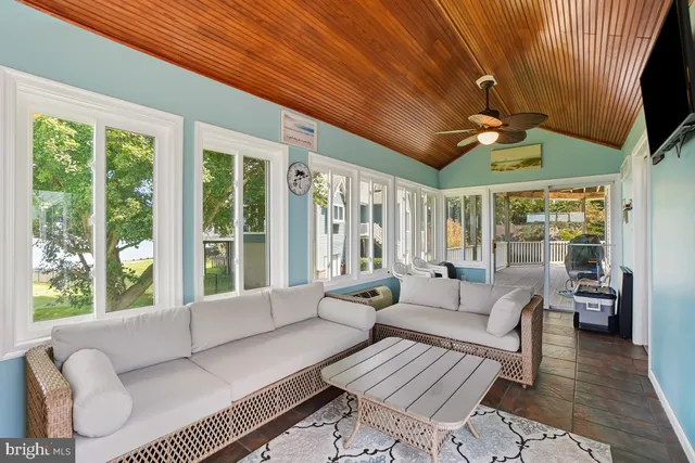 a bedroom with a bed and a mirror