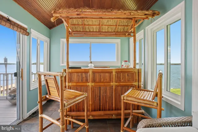 a view of storage and utility room with racks on the wall