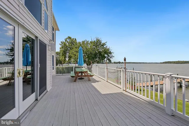 a view of living room with furniture and a fireplace