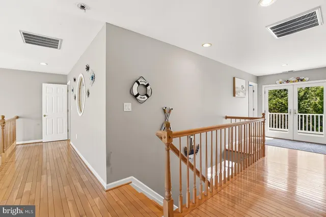 a view of a lake with a house swimming pool and outdoor space