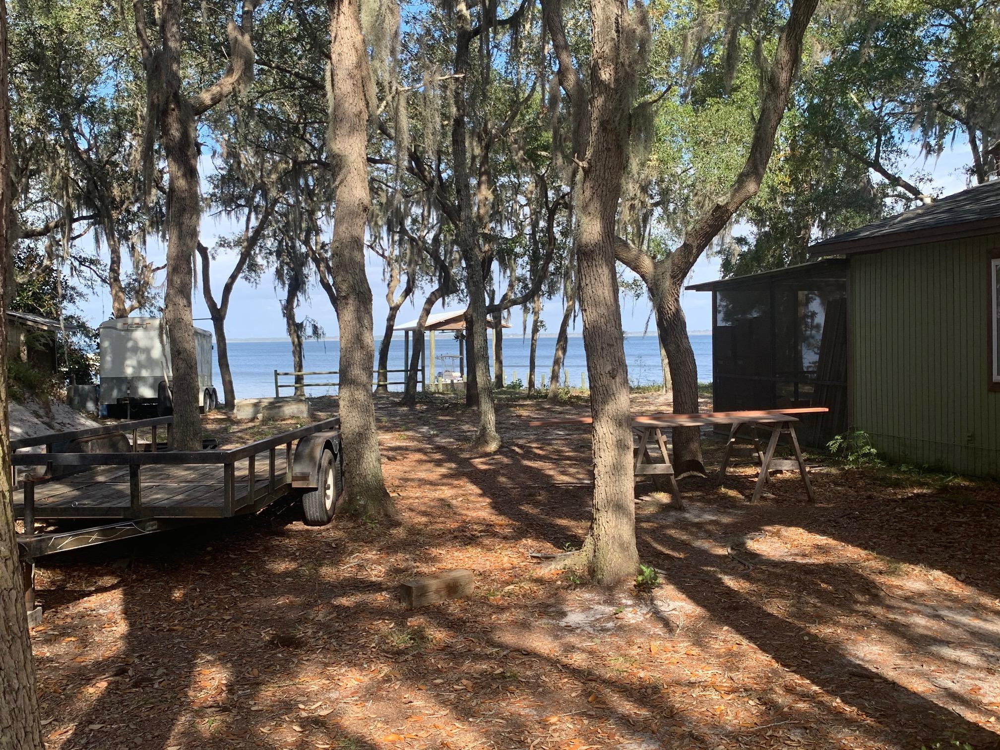 175 East Mitchell Avenue Santa Rosa Beach, FL 32459 - Photo 6 of 7 yard with trailers