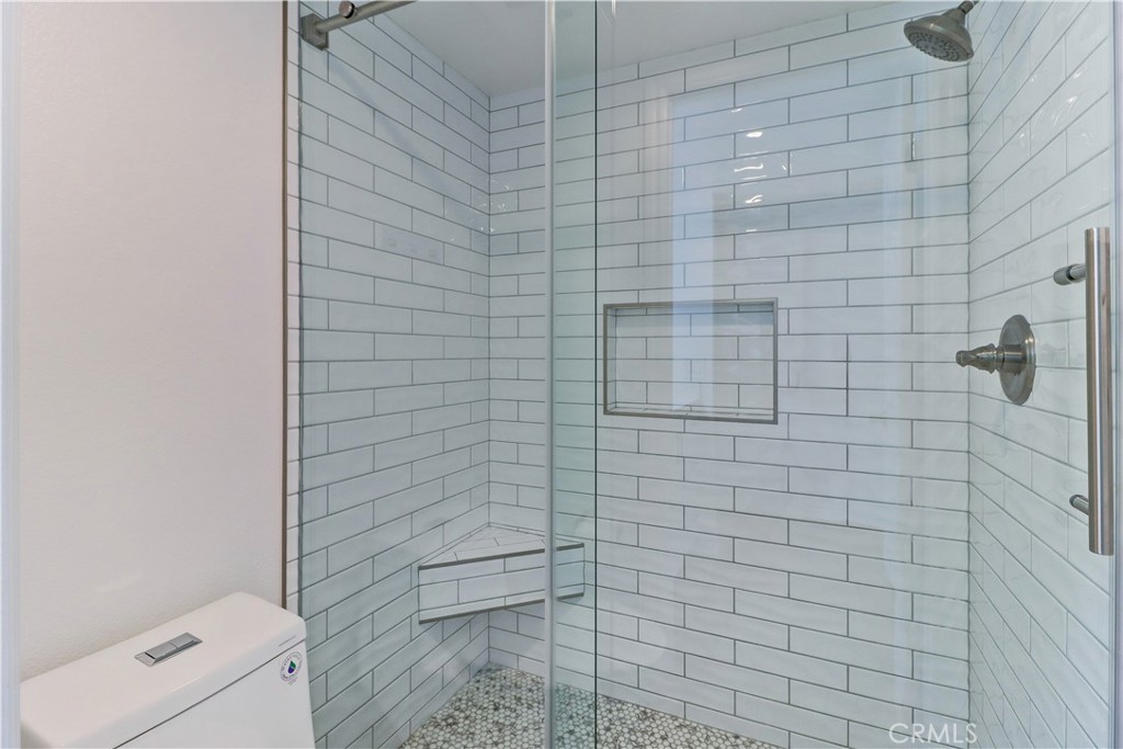 34026 Selva Road, Unit 65 Dana Point, CA 92629 - Photo 12 of 21 a bathroom with a shower