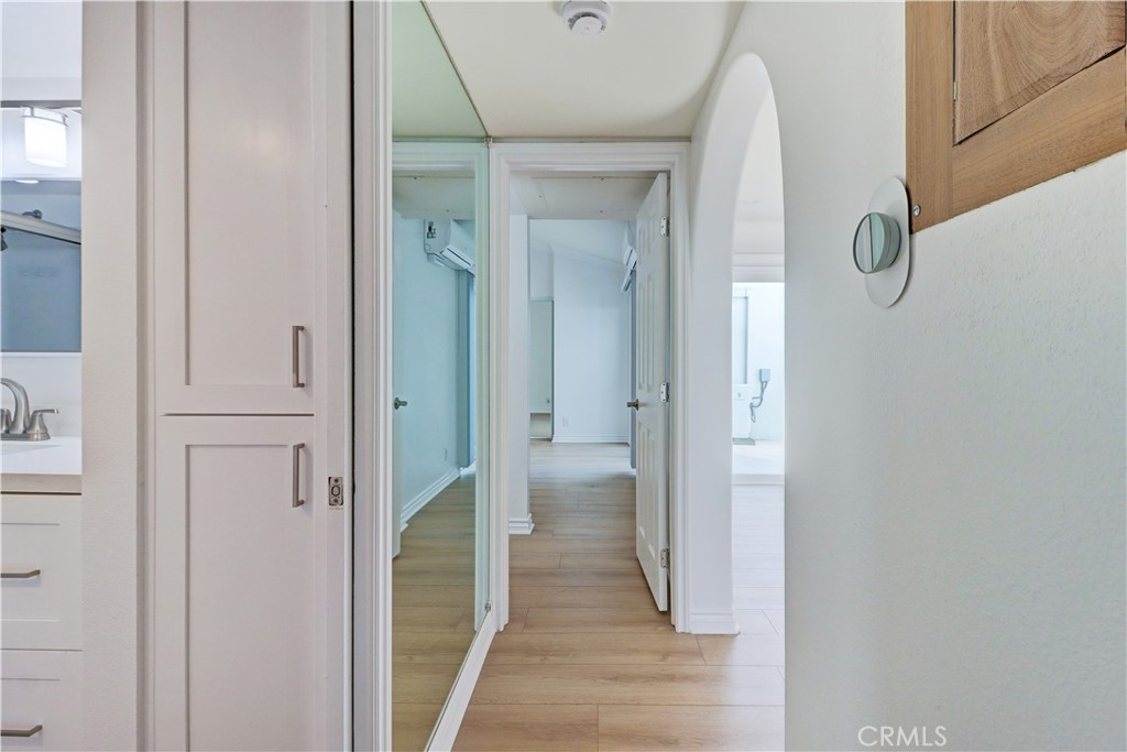 34026 Selva Road, Unit 65 Dana Point, CA 92629 - Photo 13 of 21 a view of a bathroom from a hallway