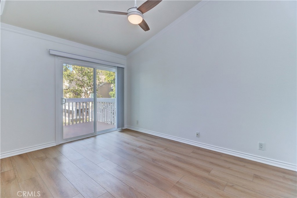 34026 Selva Road, Unit 65 Dana Point, CA 92629 - Photo 14 of 21 wooden floor in an empty room with a window