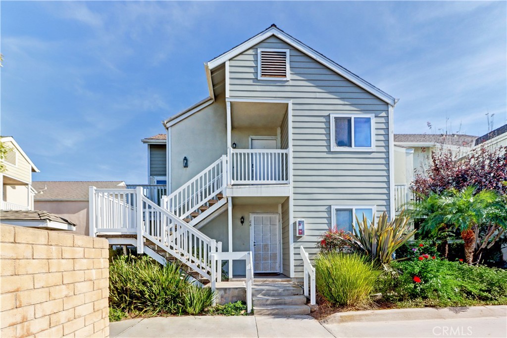 34026 Selva Road, Unit 65 Dana Point, CA 92629 - Photo 17 of 21 a front view of a house with plants