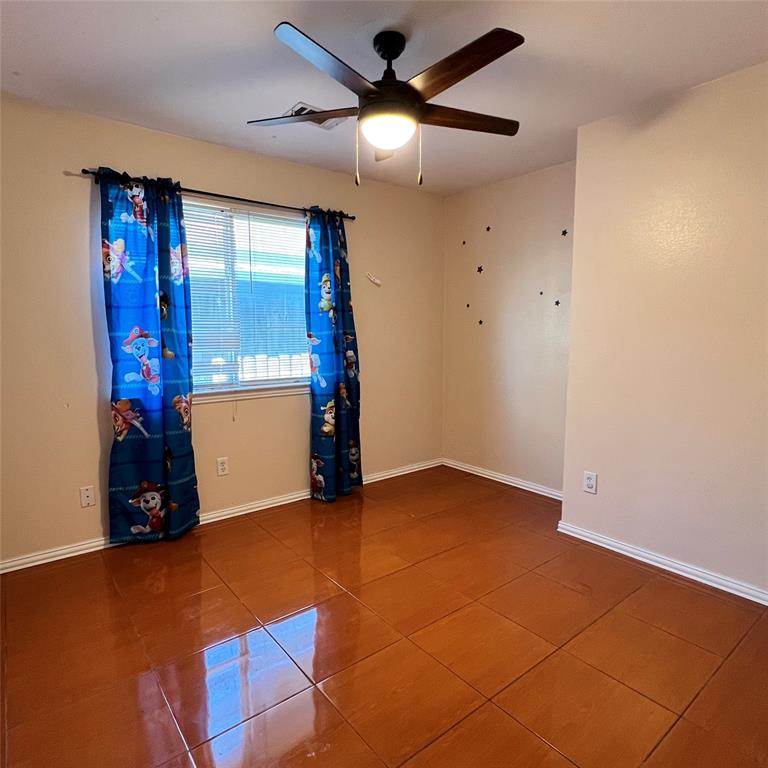 5022 El Sol Street Dallas, TX 75236 - Photo 11 of 16 a view of an empty room with a window