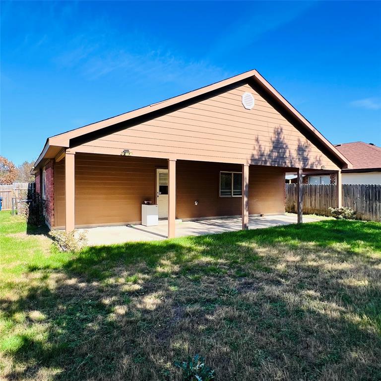 5022 El Sol Street Dallas, TX 75236 - Photo 14 of 16 a front view of house with yard and green space