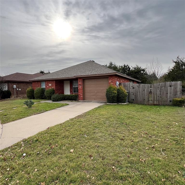5022 El Sol Street Dallas, TX 75236 - Photo 3 of 16 a front view of a house with a yard