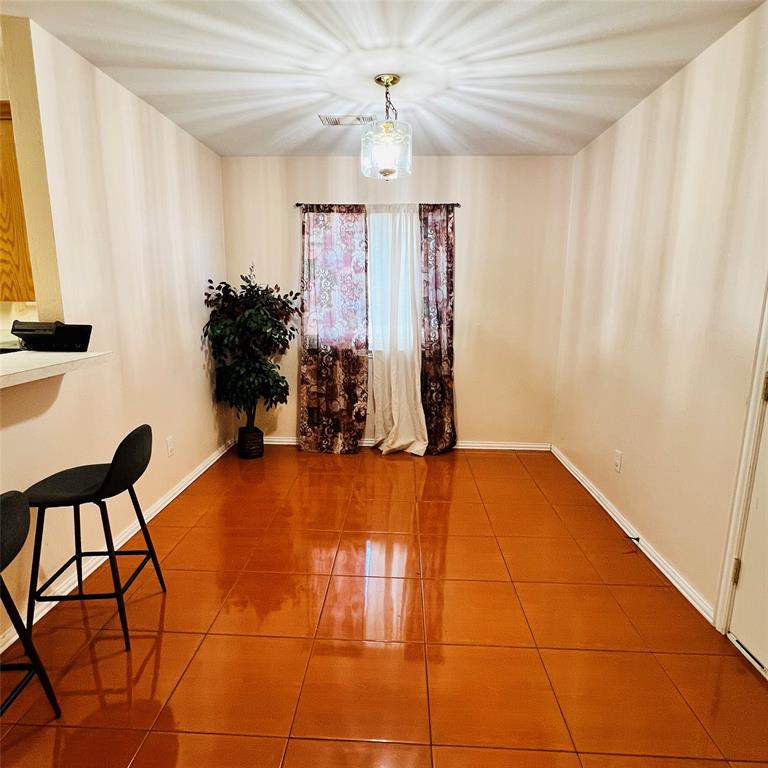 5022 El Sol Street Dallas, TX 75236 - Photo 8 of 16 a view of a livingroom with furniture and a window