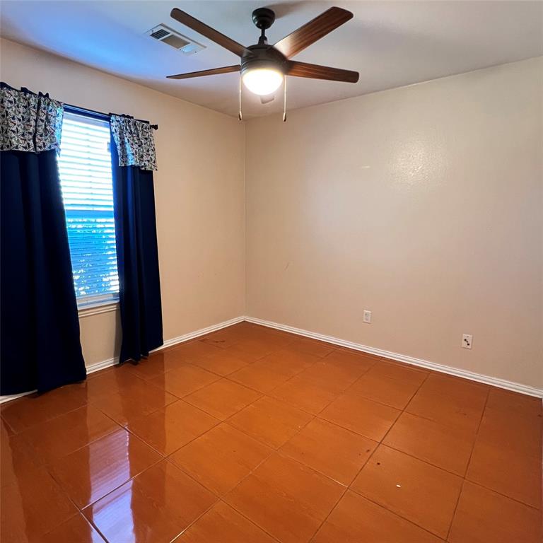 5022 El Sol Street Dallas, TX 75236 - Photo 10 of 16 a view of an empty room with a window