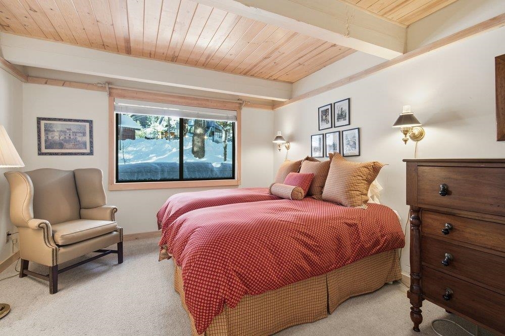 1499 Sandy Way Olympic Valley, CA 96146 - Photo 15 of 28 a bedroom with a bed and a couch