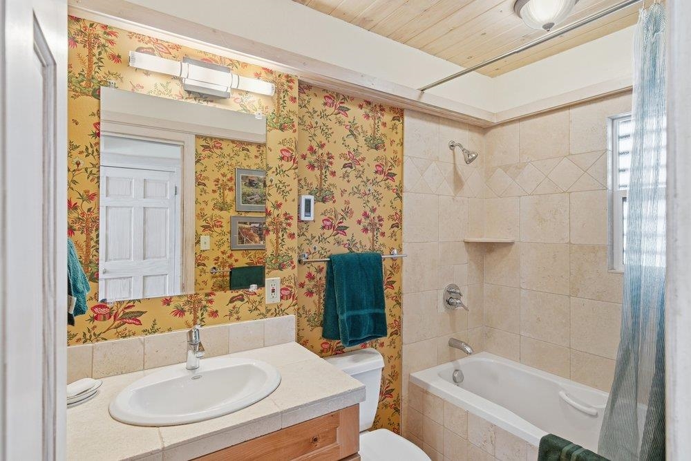 1499 Sandy Way Olympic Valley, CA 96146 - Photo 16 of 28 a bathroom with a sink and a mirror