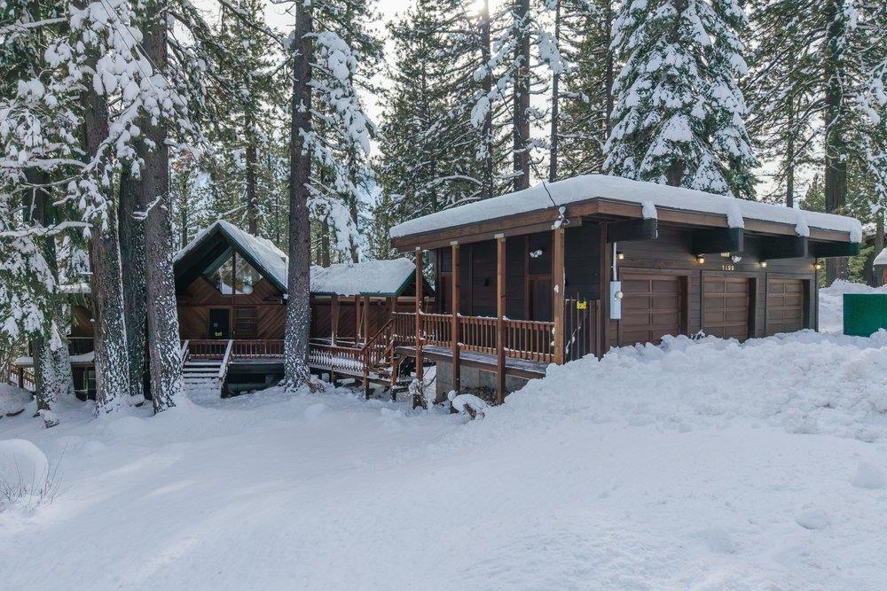 1499 Sandy Way Olympic Valley, CA 96146 - Photo 2 of 28 a view of a house with a yard and sitting area