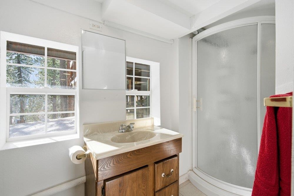 1499 Sandy Way Olympic Valley, CA 96146 - Photo 23 of 28 a bathroom with a sink and a mirror