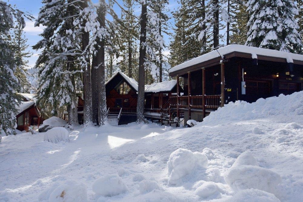 1499 Sandy Way Olympic Valley, CA 96146 - Photo 27 of 28 a view of a house with a yard covered in snow