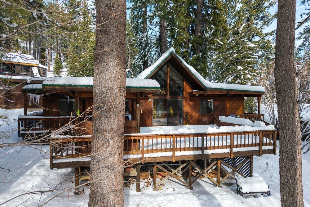 1499 Sandy Way Olympic Valley, CA 96146 - Photo 3 of 28 a view of a house with a porch and furniture