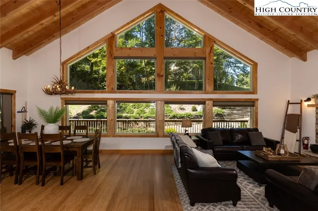 a bedroom with a bed and a table