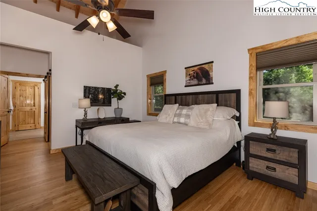 a view of a balcony with wooden floor