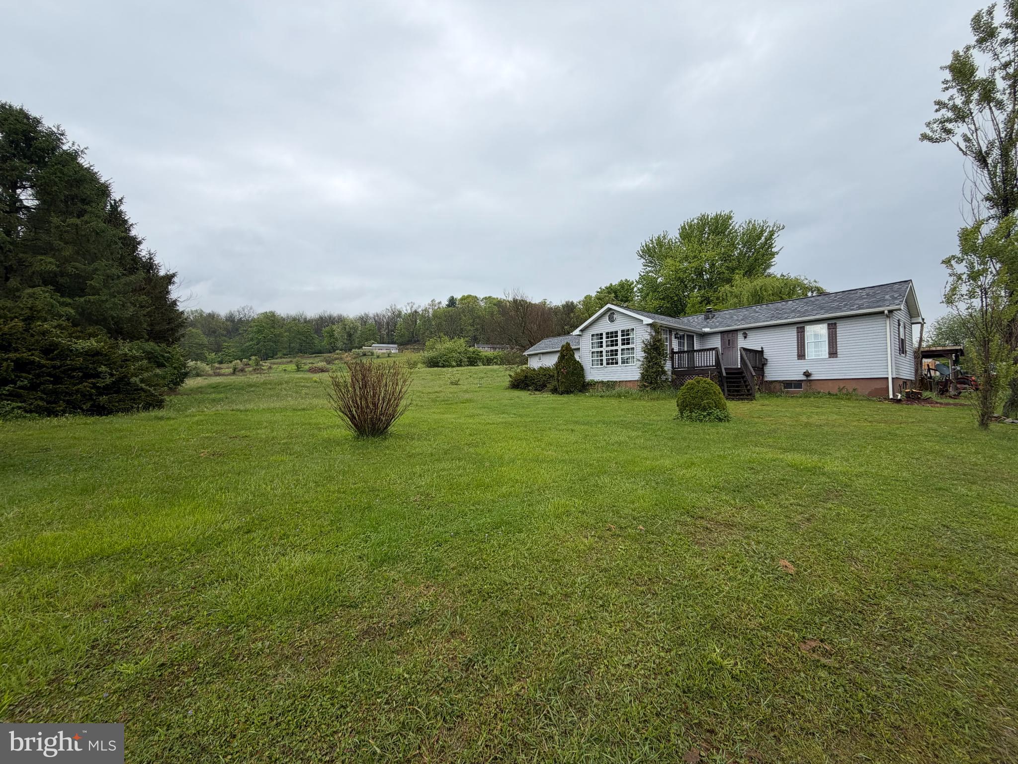 1614 Alfarata Road McClure, PA 17841 - Photo 2 of 29 a view of a house with a yard and sitting area