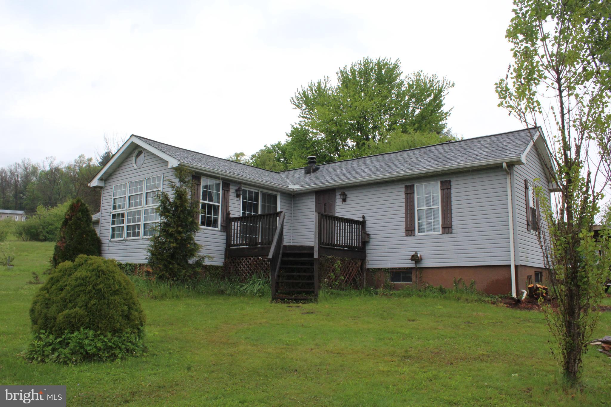 1614 Alfarata Road McClure, PA 17841 - Photo 3 of 29 a front view of house with a garden