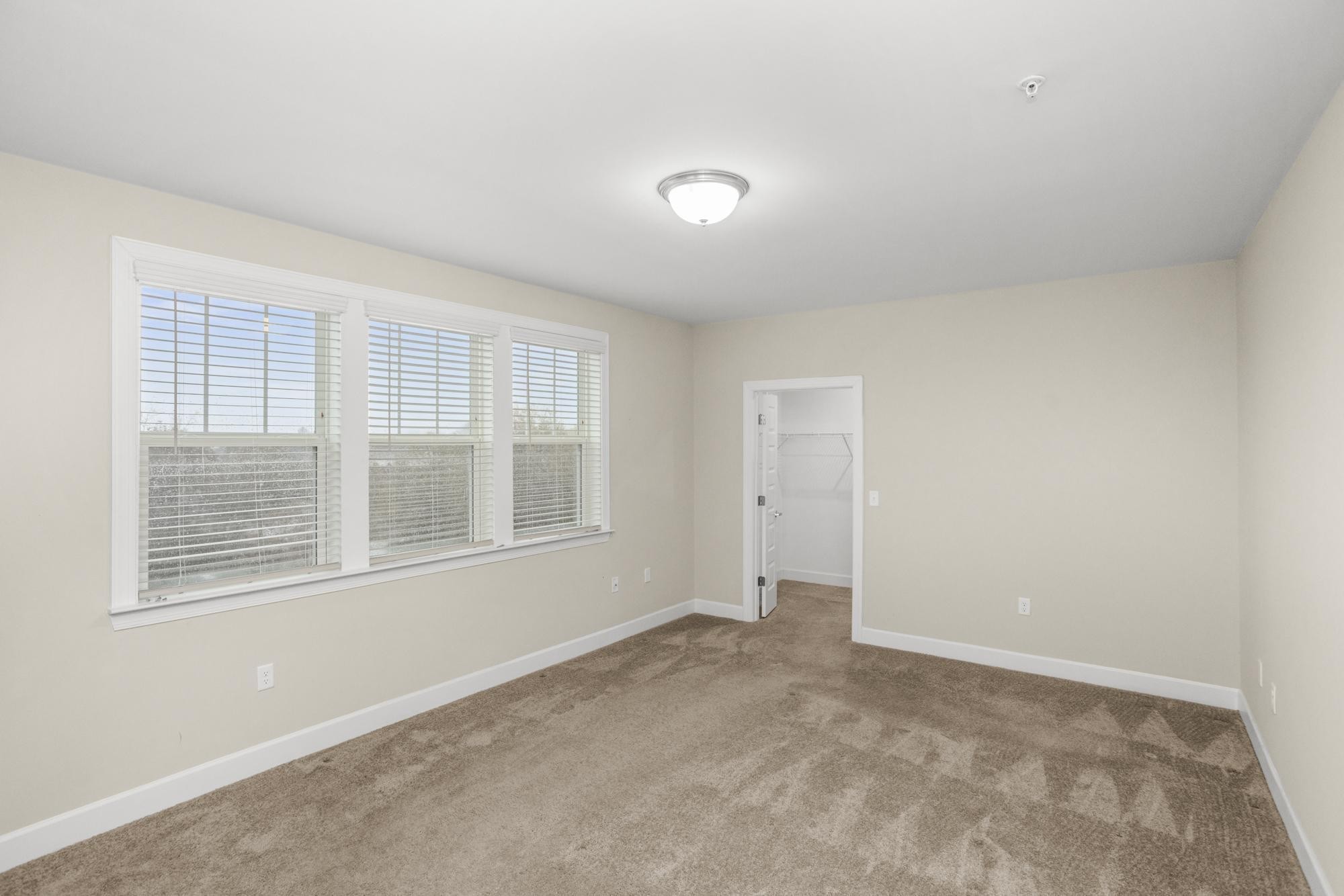 141 Saundersville Road, Unit 1402 Hendersonville, TN 37075 - Photo 14 of 60 a view of an empty room with a window